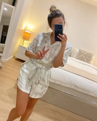 Customer taking a selfie wearing her new short pyjama set made from silky soft, breathable, bamboo satin.