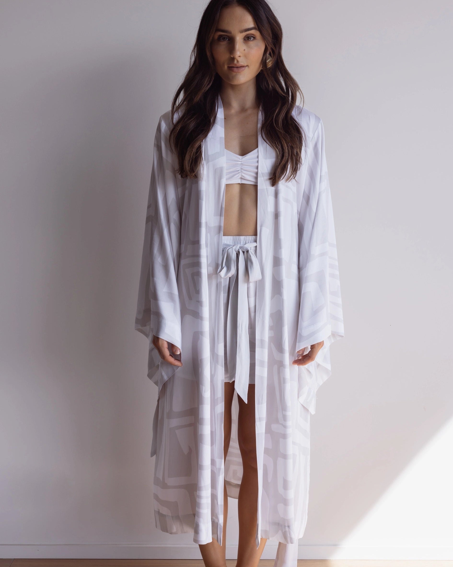 White and grey kimono style robe with wide sleeves. Made from 100% bamboo satin.