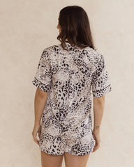 Woman wearing animal print bamboo pyjama set – soft, breathable luxury sleepwear for women designed in Australia.