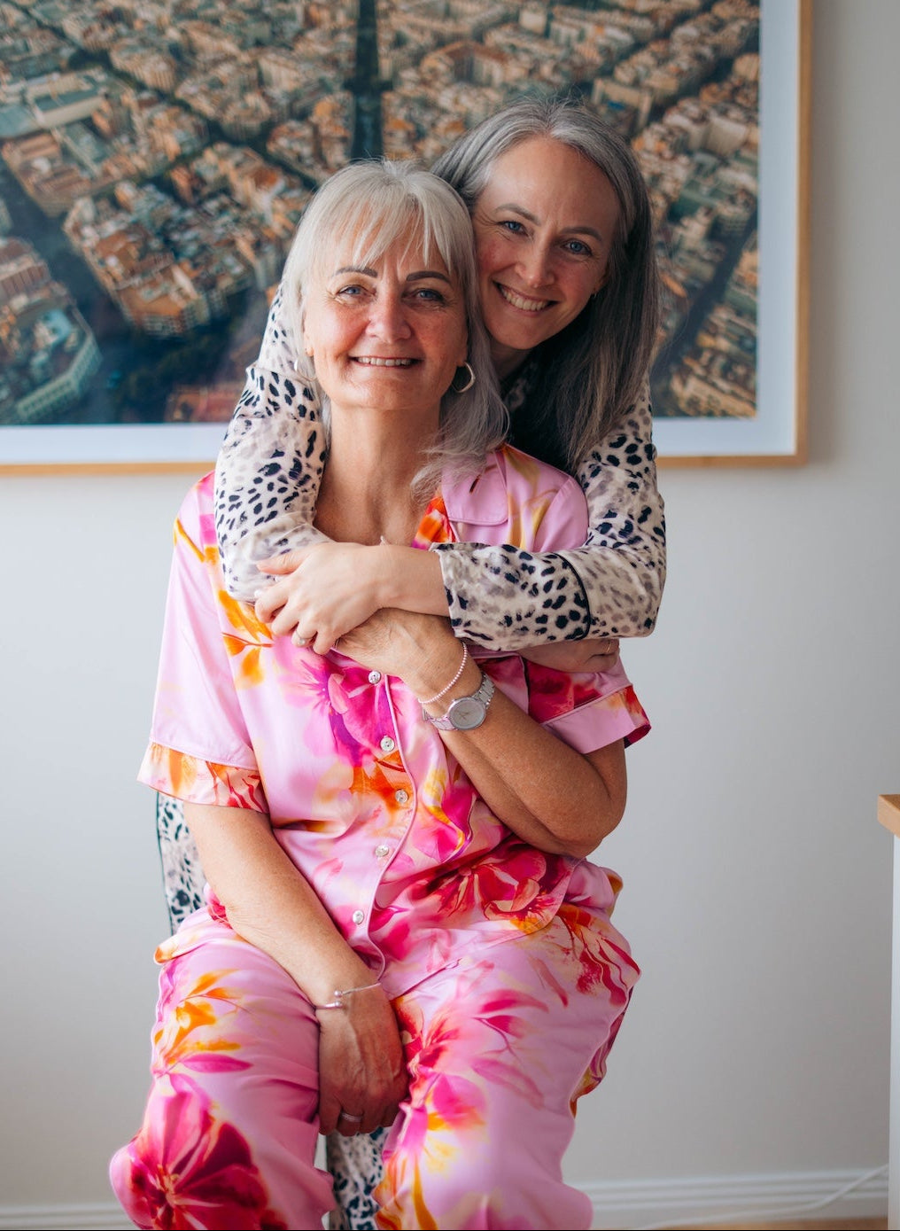 Founder of Dawn & Dusk Co. and her mum (Dawn) hugging in pyjamas