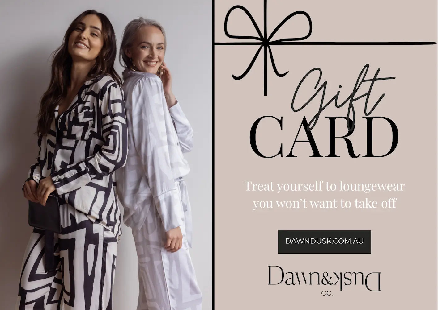Dawn & Dusk Co. gift card with a photo of two women smiling in their silky soft bamboo loungewear. Text reads "Treat yourself to loungewear you won't want to take off".