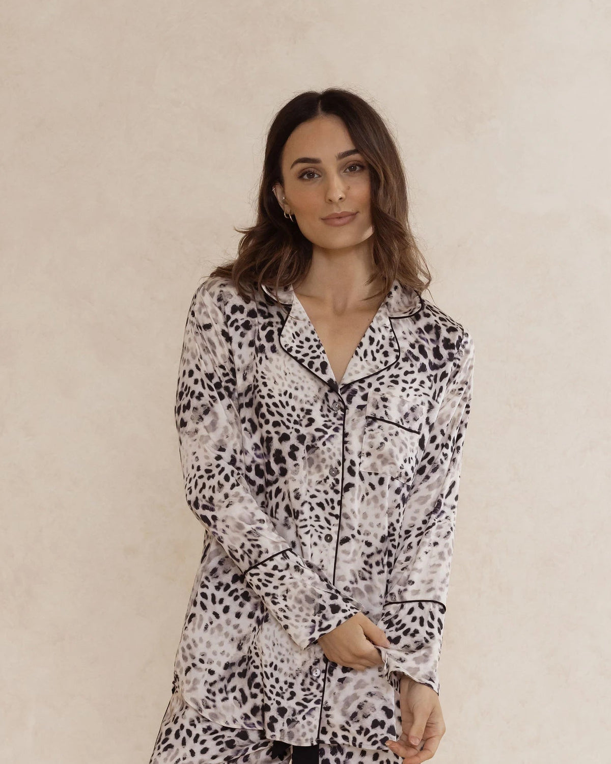 Long sleeve animal print pyjama top. With shell buttons and elegant piping. Made from 100% bamboo satin. Silky soft, breathable and comfortable. Australian designed.