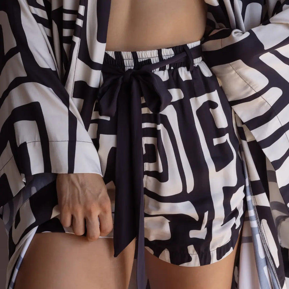 Black and cream bamboo pyjama shorts – lightweight and breathable sleepwear with hidden pockets.