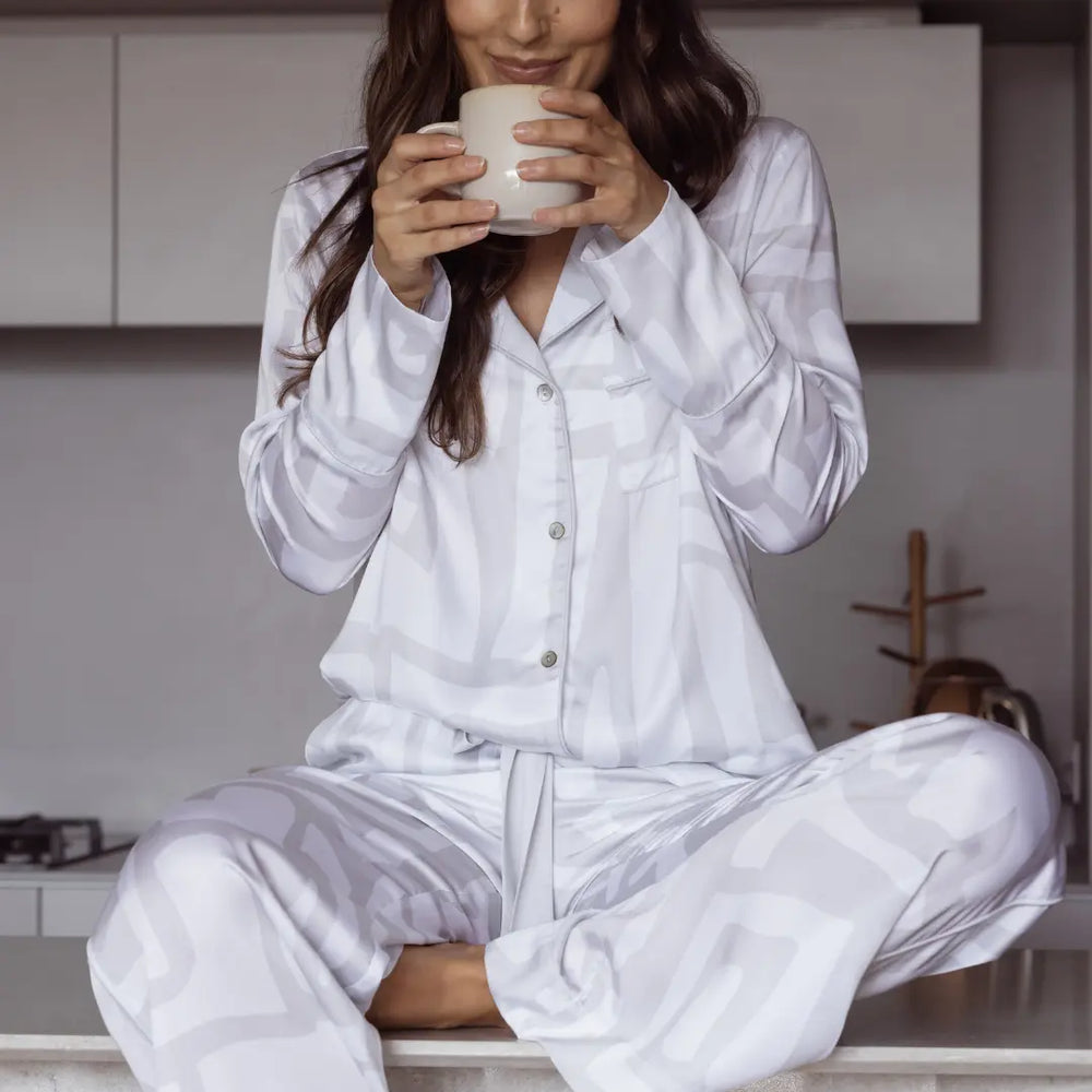 White bamboo pyjama set with grey geometric print - breathable long sleeve and pants. Perfect for lounging all day.