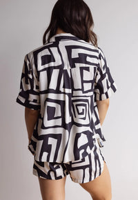 The back of a bold design short pyjama set bamboo satin fabric.