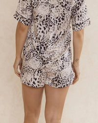 Animal print shorts made from silky soft, breathable bamboo satin. With an elasticated waistband, functional pockets and waist tie.