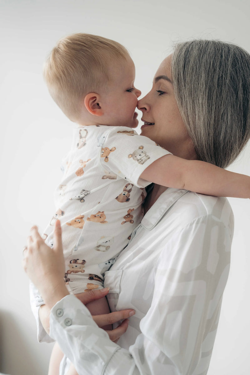 mother and son hugging in pyjamas