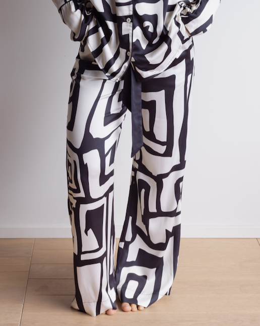 Relaxed fit pyjama pants made from silky, breathable satin bamboo in a bold geometric print with black and cream colours.