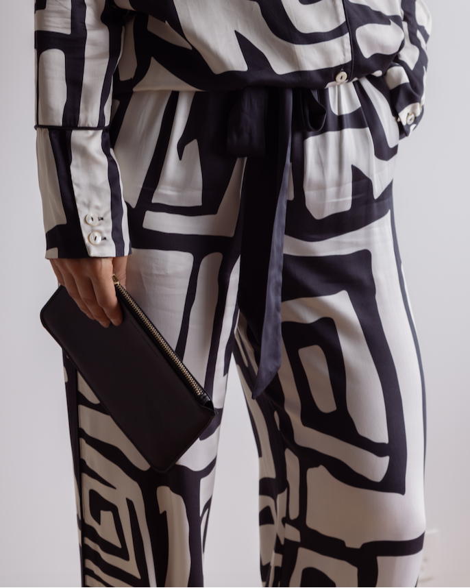 Silky-soft, breathable bamboo loungewear pants, with an elasticated waistband, waist tie and pockets.  Geometric pattern in black and cream.